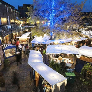 Early evening Christmas shoppers at Camden Lock Market, London
