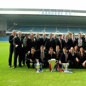 Rangers arrive back at Ibrox after winning the Treble. 31 / 05 / 03