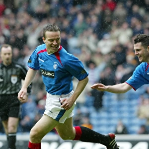 Rangers Football Club: Double Celebration - Gavin Rae and Steven Thompson Rejoice in SPL Victory over Partick Thistle (17/04/04)
