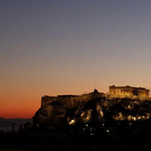 The Acropolis hill is seen during sunset in Athens