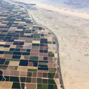 Agricultural farm land is shown next to the desert in the Imperial valley near El Centro