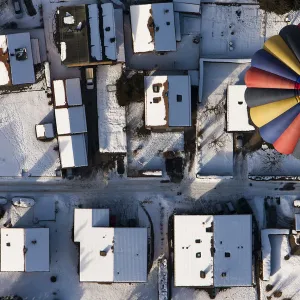 A balloon flies during the International Hot Air Balloon Week in Chateau-d Oex