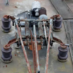 A catenary is seen on a train locomotive parked at a so-called train cemetery inside a