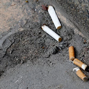 Cigarette butts litter the street in Rochefort