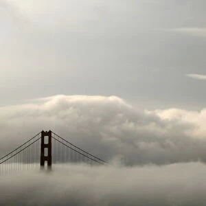 Fog envelops the Golden Gate Bridge in San Francisco, California