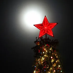 Illuminated red star sits atop Christmas tree in southern Russian city of Stavropol