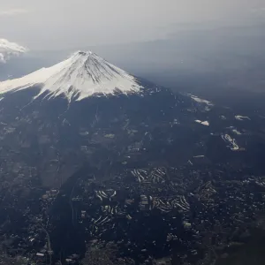 Japans Mount Fuji is seen covered with snow from an airplane