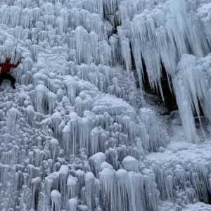 A man climbs an artificial wall of ice in the city of Liberec