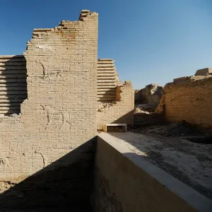 A man walks in the ancient city of Babylon near Hilla