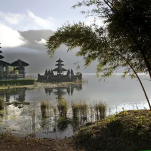 The morning sun illuminates Pura Ulun Danu Bratan, a 17th century Buddhist-Hindu temple