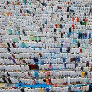 Muslims offer Eid al-Fitr prayers marking the end of the holy fasting month Ramadan