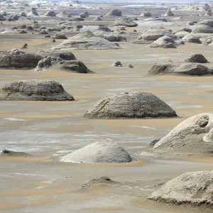 Rocks known as El Mokhimat are seen in the Old White Desert near the Farafra Oasis