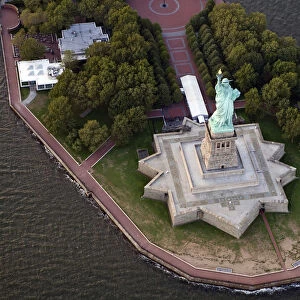 The Statue of Liberty stands in New York Harbor