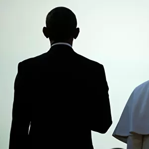 U.S. President Obama stands with Pope Francis during an arrival ceremony at the White