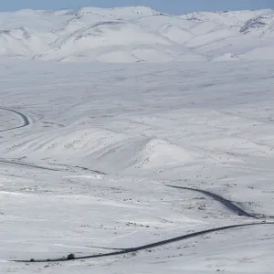 Vehicles drive along the R257 federal highway north of Kyzyl