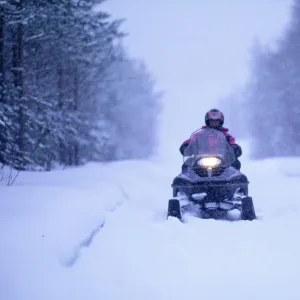 Snow mobile on Finnish track near Ivalo in Finnish Lapland Finland winter