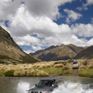 4WD crossing the Mararoa River, near Mavora Lakes, Southland, South Island, New Zealand