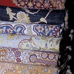 Africa, Egypt, Cairo. El Sultan carpet school - fine wool carpets folded inside out