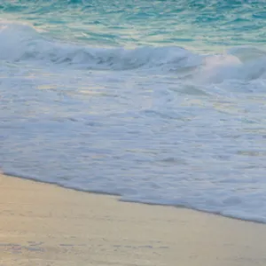 Bahamas, Little Exuma Island. Sunset on beach