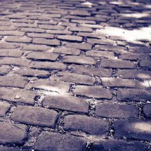 Cobblestone walkway at Pere Lachaise Cemetery, Paris, France