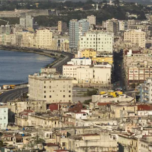 Cuba, Havana. An elevated view of the city skyline showing the bay and Malecon