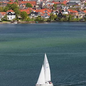 Denmark, Funen, Svendborg, elevated town view with sailboat