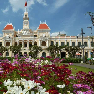 Flowers and historic Peoples Committee Building (former Hotel de Ville de Saigon)