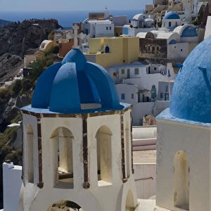 Greece and Greek Island of Santorini town of Oia with Blue Domed Churches with white