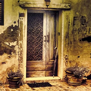 Italy, Chiusure. Infrared image of old door in typical buildings in the village