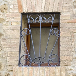 Italy, Tuscany, Province of Siena, Montalcino. Iron-barred window