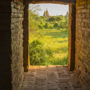 Myanmar. Bagan. View of some pagodas from inside a temple