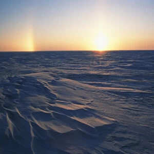 USA, Alaska, Arctic Coastal Plain, Sundog over snowy landscape