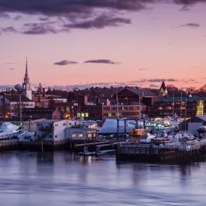 USA, Massachusetts, Newburyport, skyline from the Merrimack River at dusk