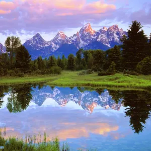 USA; Wyoming, Grand Teton National Park. A Grand Tetons reflecting in the Snake River