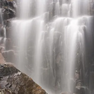 A waterfall along Hadlock Brook as seen from Waterfall Bridge in Maines Acadia National Park