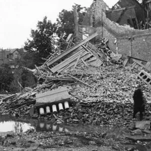 Bomb damage and crater, Petherton Road, London, WW2