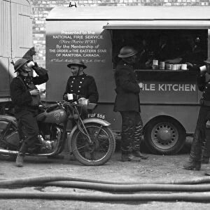 Firefighters outside mobile kitchen, WW2