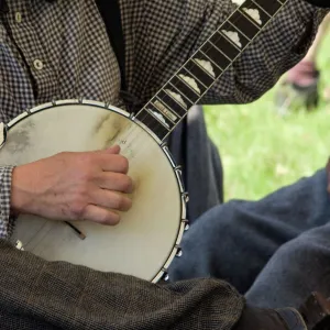 Civil War musician playing a banjo