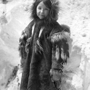 ALASKA: ESKIMO GIRL. A young Eskimo girl in traditional fur clothing, Nome, Alaska