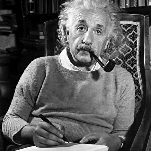 ALBERT EINSTEIN (1879-1955). American (German-born) theoretical physicist. Photographed at his home in Princeton, New Jersey, 1940, by Luicien Aigner