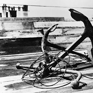 ANCHORS, 1938. Anchors on the dock at Burrwood, Louisiana. Photograph by Russell Lee