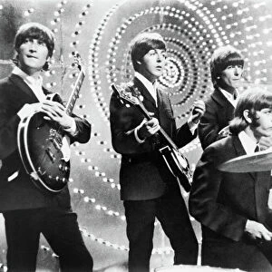 THE BEATLES, c1964. The Beatles in concert. Photograph, c1964