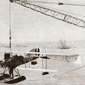 British seaplane being launched from a warship during World War I. Photograph, c1916