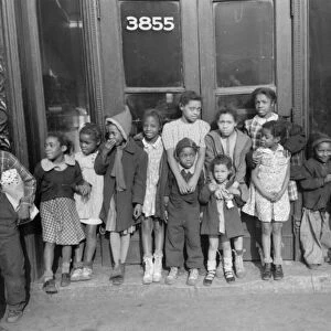 CHICAGO: CHILDREN, 1941. Group of African American children outside a building