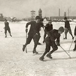A group of young textile mill boys playing ice hockey on a Sunday morning on Park Pond in New Bedford, Massachusetts. Photograph by Lewis Hine, January 1912