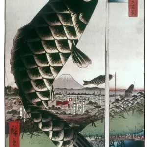 HIROSHIGE: KITES, 1857. Carp kites flown from masts. Color woodblock print from One Hundred Famous Views of Edo, by Utagawa Hiroshige, 1857