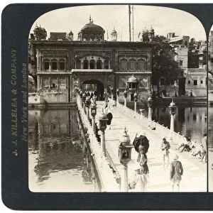 INDIA: GOLDEN TEMPLE, c1907. Entrance gate and causeway over the sacred tank, Golden Temple