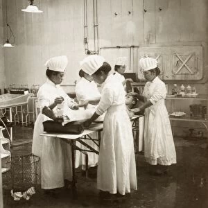JAPAN: HOSPITAL, c1905. Nurses tending to a patient in an operating room at a hospital in Japan