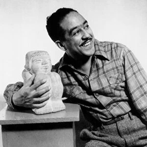 LANGSTON HUGHES (1902-1967). American writer. Photographed by Gordon Parks, 1943
