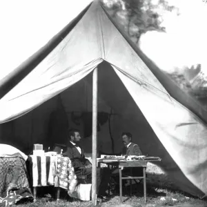 LINCOLN & McCLELLAN. Abraham Lincoln (1809-1865), 16th President of the United States, and General George B. McClellan on the battlefield in Antietam, Maryland. Photograph by Alexander Gardner, probably 3 October 1862